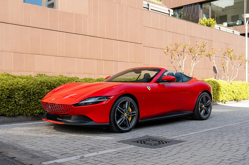 government travel solution–luxury travel vip protection elite services red ferrari rental